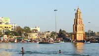 NASHIK, MAHARASHTRA, INDIA, April 2019, Devotee taking bath at Ramkund near Shree Yashwantrao Maharaj Sadhu Dev Mamledar temple