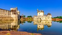 Queen Padminiâ  s Palace is one of the earliest palaces in India to be constructed completely surrounded by water. It is three storied building  built in medieval era in Rajasthani architectural style.