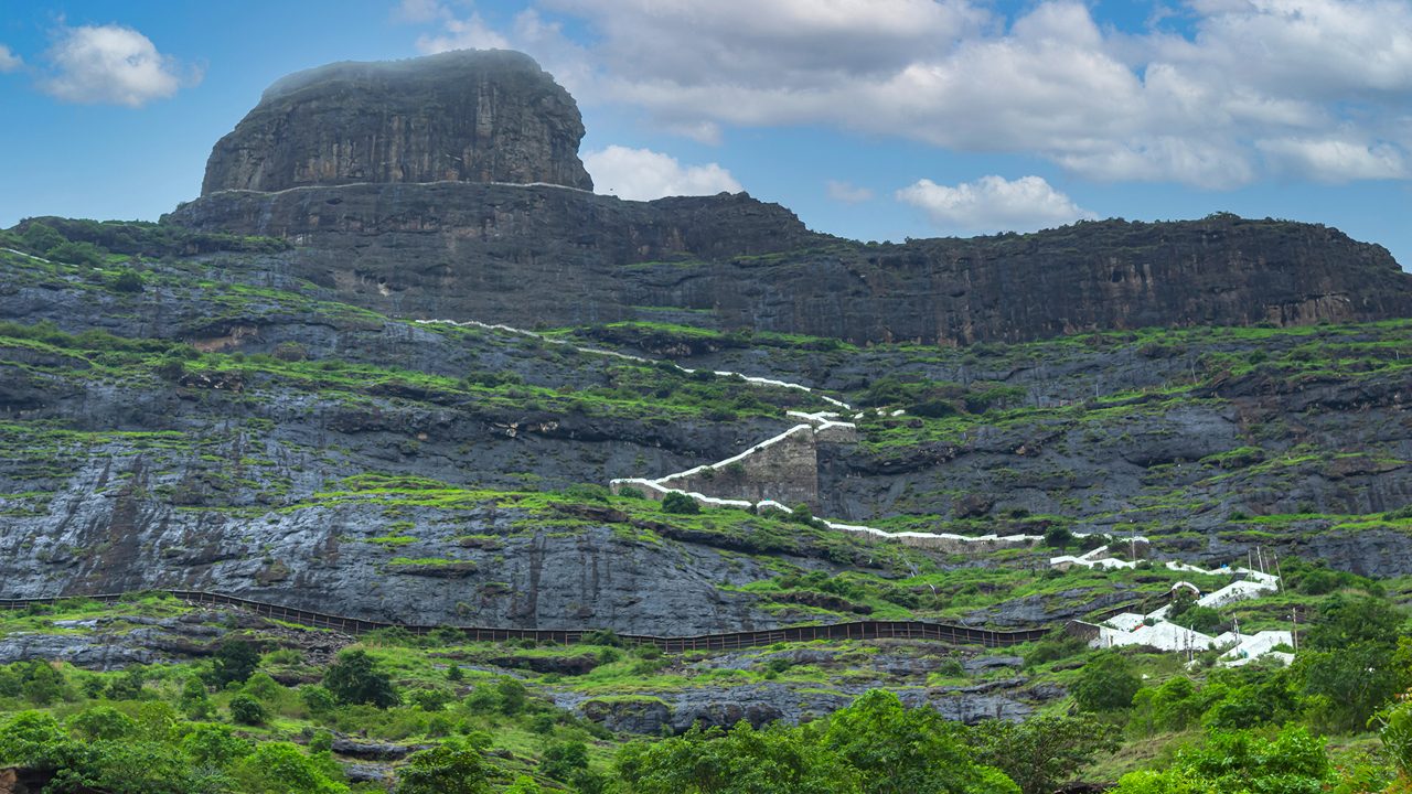 Mangi Tungi hill and stairs leading to the top, Mangi Tungi, Nashik, Maharashtra, India. Prominent twin-pinnacled peak with plateau in between.