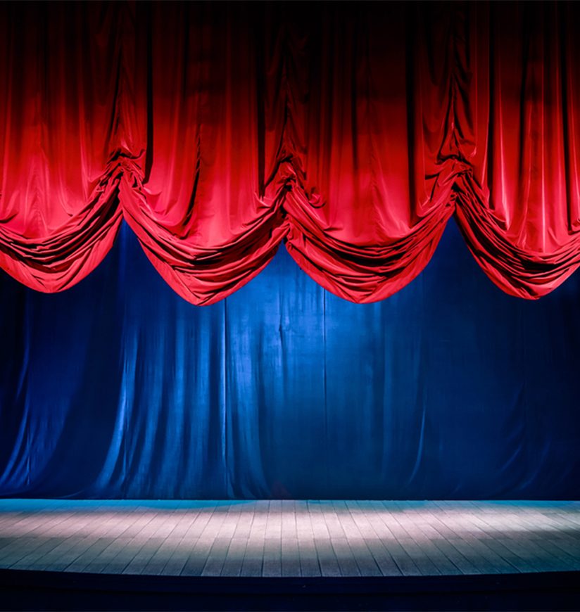 Theater curtain and stage with dramatic lighting