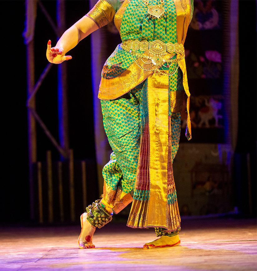 Fragment photo of indian dancer, only legs cropped, Legs fragment photo of indian kuchipudi dancer. Women from folk music group presenting traditional indian costume. Dancer in movement photo