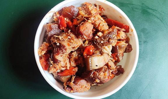 Naga Pork curry is a delicious and exotic pork curry of Nagaland, India. It is prepared with Smoked Pork, Fermented Bamboo shoot and Ghost pepper.