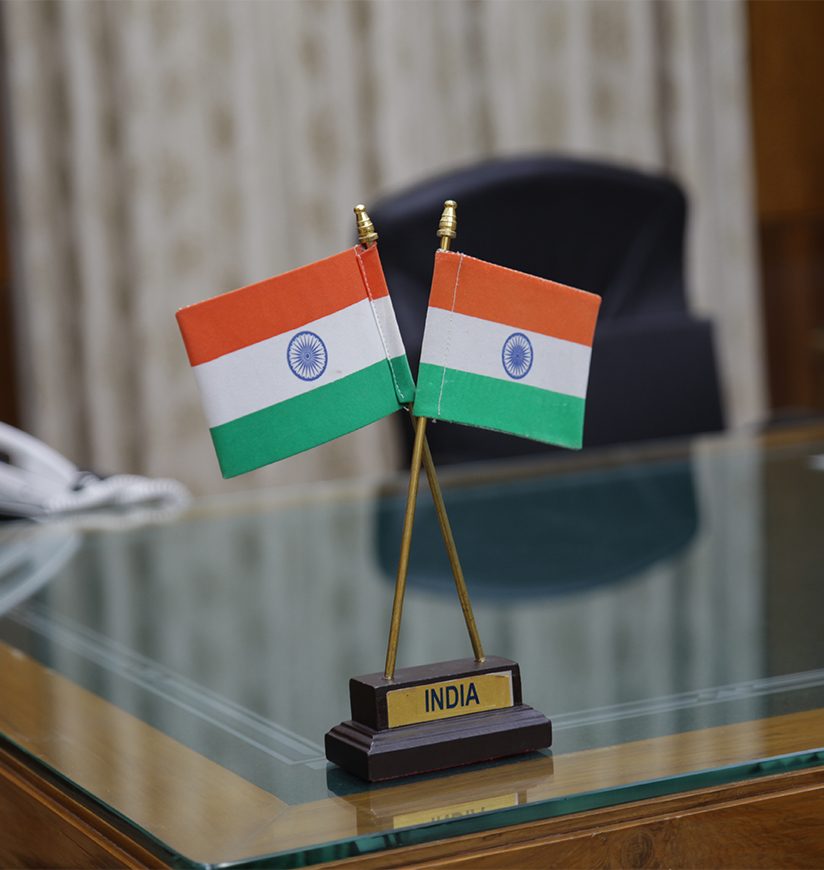 Indian tricolor flag placed on the executive table of a powerful government officer.