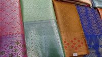 A Banarasi sari is a sari made in Varanasi, an ancient city which is also called Benares (Banaras)."selective focus"