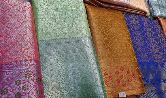 A Banarasi sari is a sari made in Varanasi, an ancient city which is also called Benares (Banaras)."selective focus"