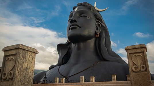 adiyogi shiva statue from unique different perspectives image is taken at dhyanlinga coimbatore india on jan 02 2020. it is the shiva statue made of steel at the foothills of Velliangiri mountain.