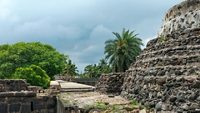 a picture of arnala fort with stone texture and design.