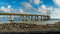 Bandra Worli Sea Link at sunset with Bandra Fort in the foreground