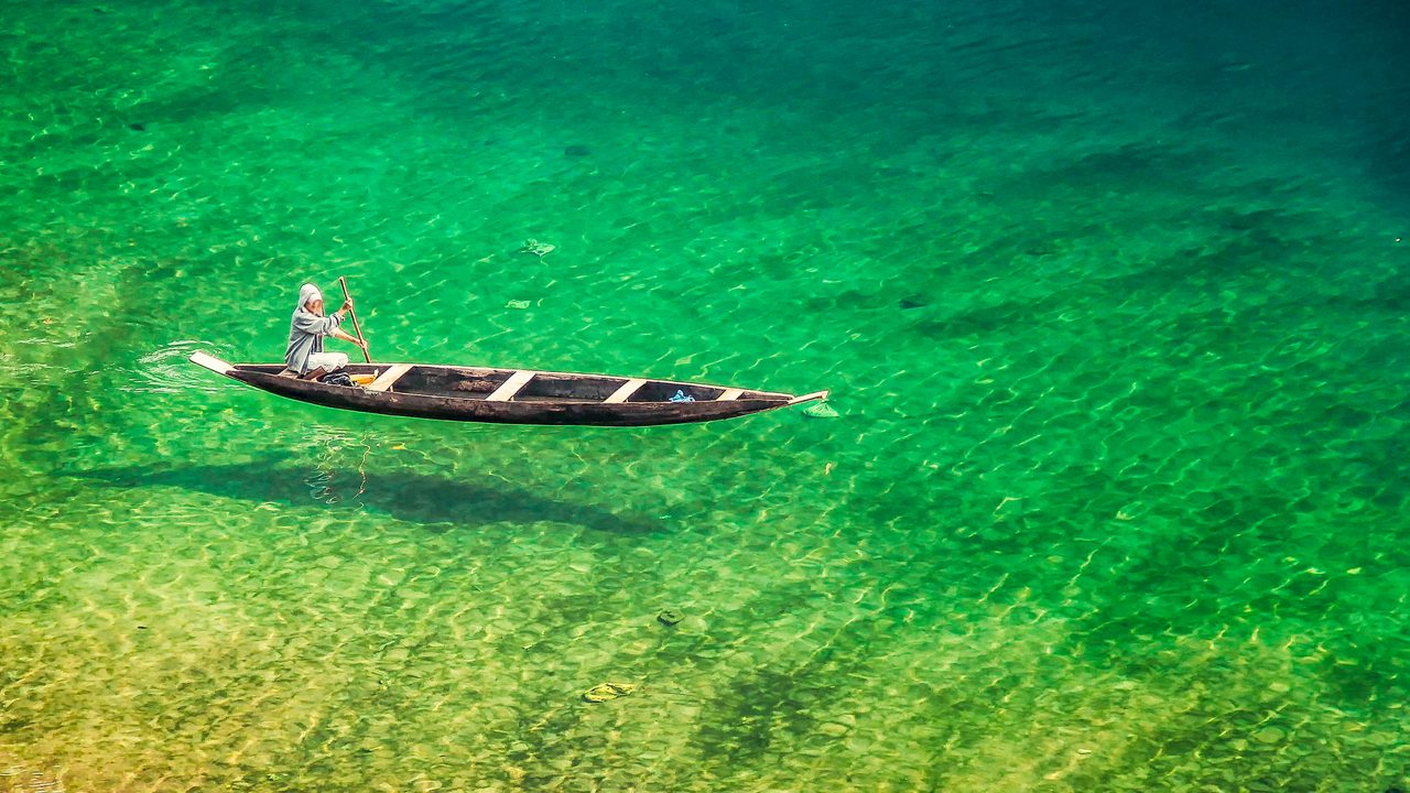 Everyday Fishing on Dawki river in Dawki ,India Bangladesh Border, Meghalaya, India