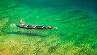 Everyday Fishing on Dawki river in Dawki ,India Bangladesh Border, Meghalaya, India