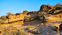 Fossil Park at Dholavira in Great Rann of Kutch, Gujarat India. A Tree Fossil sandwiched between the Layer of Lava around 176 Million years ago after a big volcanic eruption.