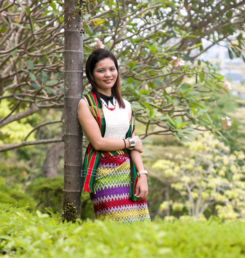 A Young Zomi Woman Wearing Traditional Dress