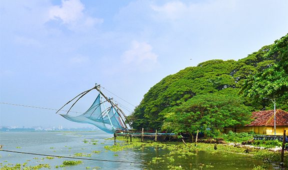 Chinese fishing net at Fort Kochi, weight of a man walking along the main beam is sufficient to lower the net into the sea. Incredible India.; Shutterstock ID 748688848; purchase_order: -; job: -; client: -; other: -