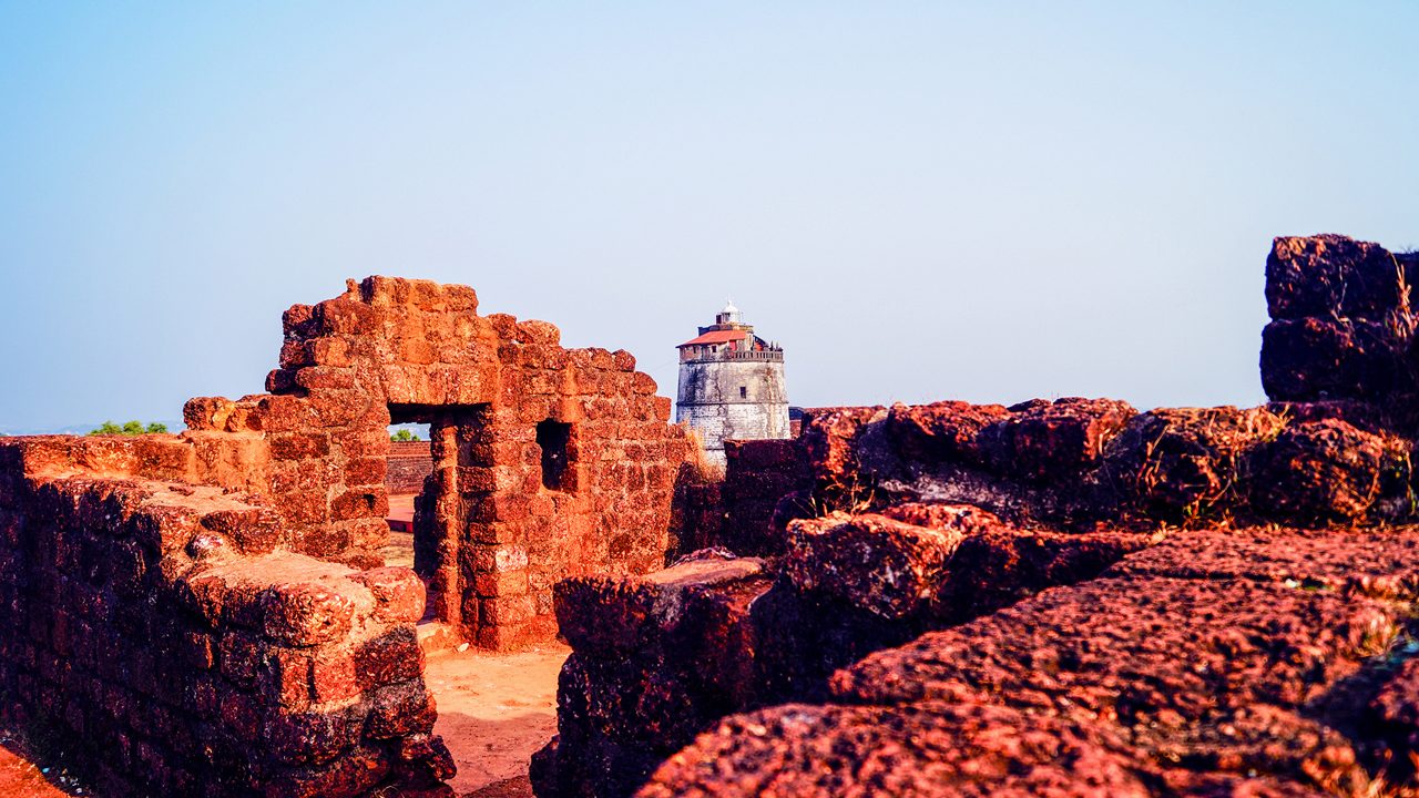 Fort Aguada on Candolim, Goa, India. Old and vintage lighthouse. Sunset time. Abandoned fort.; Shutterstock ID 761654632; purchase_order: -; job: -; client: -; other: -