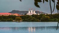 Scenic view of Hamirsar lake with Swaminarayan temple and Bhujya hill in background at Bhuj, Kutch, India
