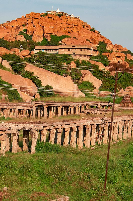 Tourist indian landmark Ancient ruins in Hampi. Hampi Bazaar, Hampi, Karnataka, India; Shutterstock ID 401634754; purchase_order: -; job: -; client: -; other: -