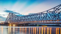 Howrah bridge - The historic cantilever bridge on the river Hooghly with twilight sky. Howrah bridge is considered as the busiest bridge in India.; Shutterstock ID 677901256; purchase_order: -; job: -; client: -; other: -