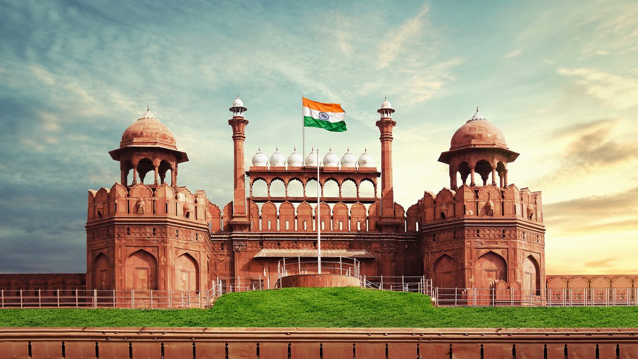 RED FORT DELHI INDIA WITH INDIA FLAG FLYING HIGH 