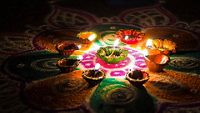 Circa 2018. Oil candles, also called Deepams, are lighted on a rangoli design to celebrate the festival of Karthigai Deepam.