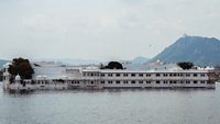 VIew of the Lake Palace, Udaipur in Lake Pichola as seen from the City palace in Udaipur, Rajasthan, India; Shutterstock ID 1526054075; purchase_order: -; job: -; client: -; other: -