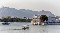 Taj Lake Palace on Lake Pichola in Udaipur India with the Aravali Mountain Range in the Background; Shutterstock ID 1072588754; purchase_order: -; job: -; client: -; other: -