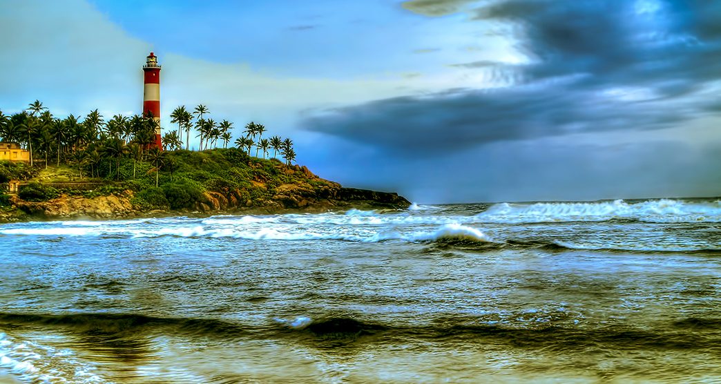 The scenic landmark location depicting the lighthouse at the popular beach of Kovalam located in the Indian city of Trivandrum,kerala