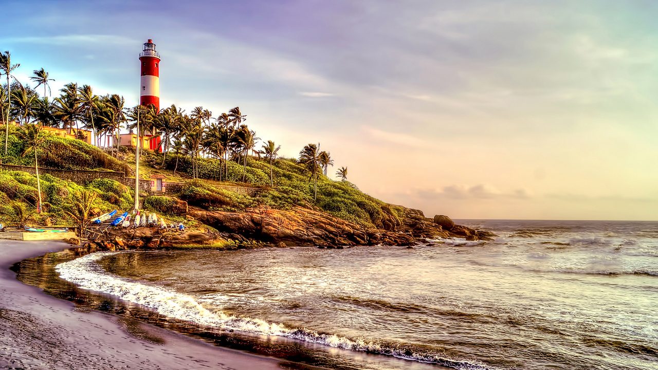 The scenic landmark location depicting the lighthouse at the popular beach of Kovalam located in the Indian city of Trivandrum,kerala