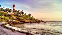 The scenic landmark location depicting the lighthouse at the popular beach of Kovalam located in the Indian city of Trivandrum,kerala