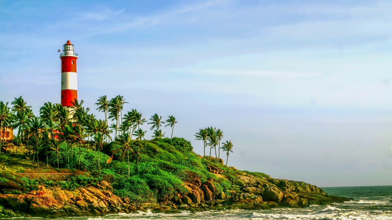 The scenic landmark location depicting the lighthouse at the popular beach of Kovalam located in the Indian city of Trivandrum,kerala