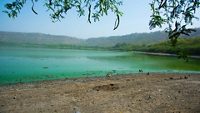 Lonar Lake or Lonar crater, is a notified National Geo-heritage Monument was create by meteor impact during the Pleistocene Epoch located at Lonar in Buldhana district, Maharashtra, India.