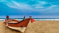 Lonely boat at mahabalipuram, mamallapuram beach, India