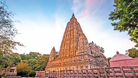 Mahabodhi Temple at dusk in Bodhgaya, Gaya, Bihar, India.Bodhgaya is the place where Buddha got enlightenment after seven weeks of meditation , so it's the most sacred place of Buddhism and a must visit destination for buddhist pilgrimage.