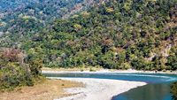 Scenic view of water flow between hills in Manas National Park, Assam, India