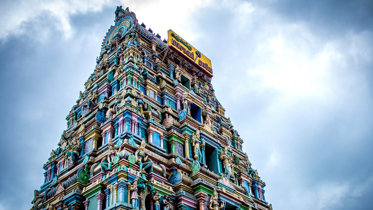 Beautiful view of the gopuram (tower) of Masani Amman Temple. (Translated from Tamil to English language as Maasani Mother). Located in Anaimalai, Pollachi, Coimbatore district of Tamil Nadu, India.; Shutterstock ID 1887531895; purchase_order: -; job: -; client: -; other: -