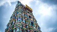 Beautiful view of the gopuram (tower) of Masani Amman Temple. (Translated from Tamil to English language as Maasani Mother). Located in Anaimalai, Pollachi, Coimbatore district of Tamil Nadu, India.; Shutterstock ID 1887531895; purchase_order: -; job: -; client: -; other: -