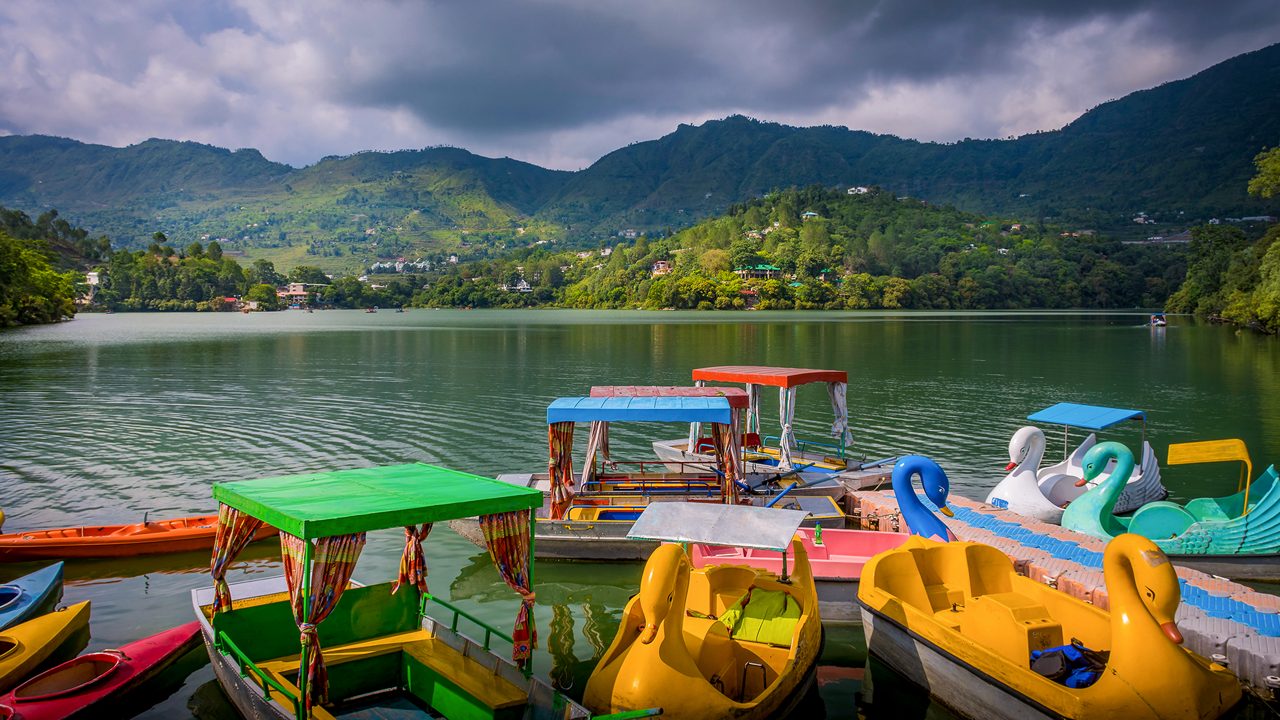 Colorful boats at Beautiful Naukuchiatal Lake, Uttarakhand, India