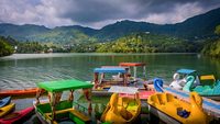 Colorful boats at Beautiful Naukuchiatal Lake, Uttarakhand, India
