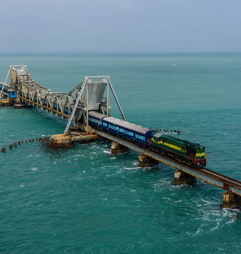 Pamban Bridge is a railway bridge which connects the town of Rameswaram on Pamban Island to mainland India.  It was India's first sea bridge.