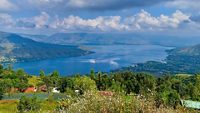 A Beautiful tourist destination, a valley with blue water river / lake, green hill / mountain on backdrop and blue sky. swituated in Panchgani , mahabaleshwar, Maharashtra