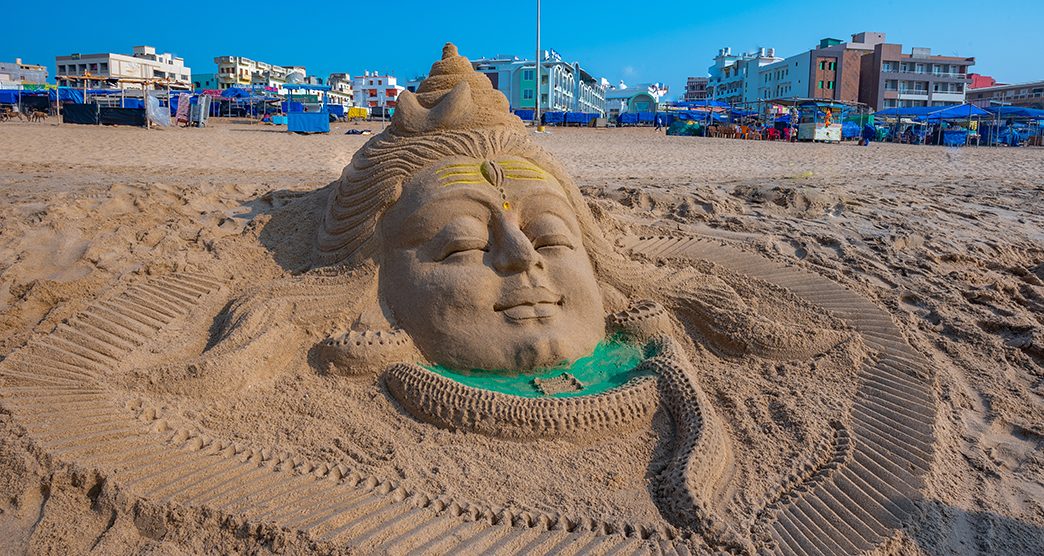 sand art work in puri sea beach