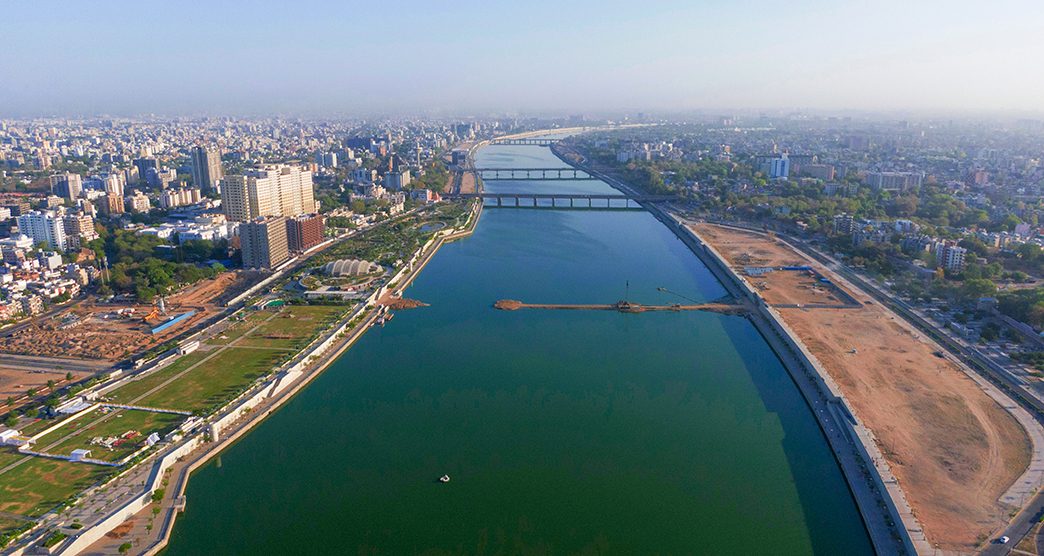 Aerial view of Ahmedabad,Gujarat/India. Riverfront and garden with skyline buildings drone view landscape. Post coronavirus covid-19 city reopens. social distancing rules after city restrictions ease.