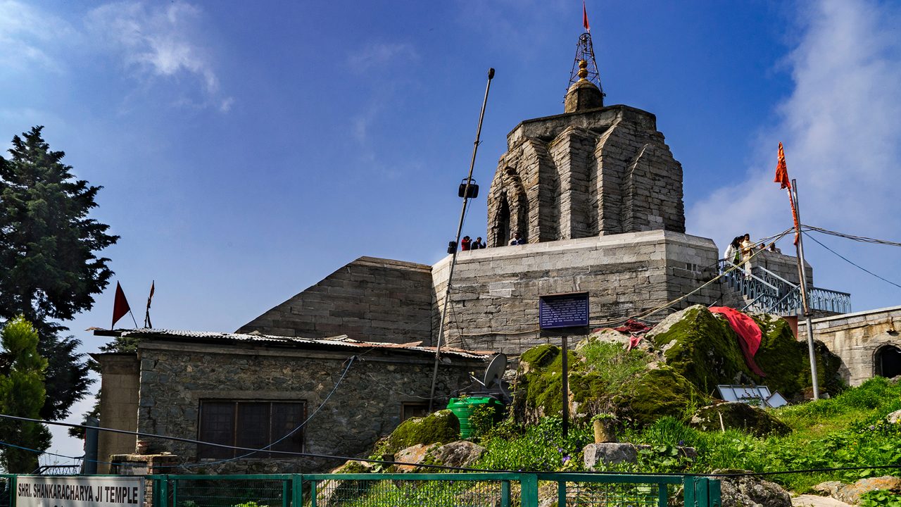  Srinagar,12,April ,2016,Kashmir India: Low angle side  view of ancient Shankaracharya temple against blue sky  background with  exit steps and tourists  ,Srinagar ,Jammu and Kashmir, India,Asia; Shutterstock ID 1116057143; purchase_order: -; job: -; client: -; other: -