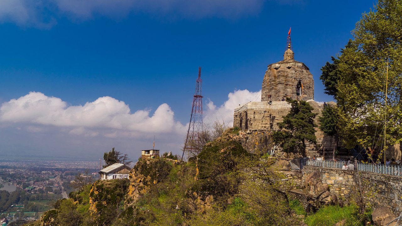 Srinagar,12,April ,2016,Kashmir India:  Ancient Shankaracharya stone temple  on hill top with Dal lake and city in background  against blue sky ,Srinagar ,Jammu and Kashmir, India,Asia; Shutterstock ID 1116002183; purchase_order: -; job: -; client: -; other: -