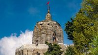 Srinagar,12,April ,2016,Kashmir India: Low angle view of ancient Shankaracharya  temple on hilltop  against  blue sky  background and surrounding greenery ,Srinagar,Jammu and Kashmir, India,Asia; Shutterstock ID 1116045194; purchase_order: -; job: -; client: -; other: -