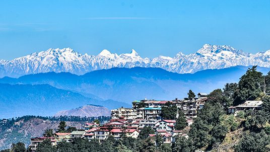 View from the Ridge Shimla. Shimla is capital city of Himchal Pradesh, state of India. It is loacted in Himalayan foothills and is favorite tourist destination.It used to Summer capital in British era