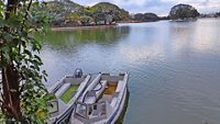 Beautiful lake view with magnificent evening clouds and boats. Ulsoor lake in the city of Gardens, Bangalore, India.