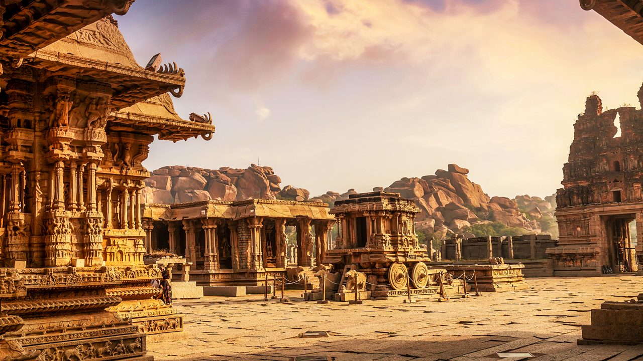 Ancient architecture at the Vijaya Vittala temple built in the 15th century AD at sunrise at Hampi Karnataka, India