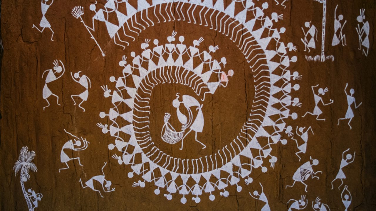 Warli Painting on the wall of a Indian Village Hut of Maharashtra