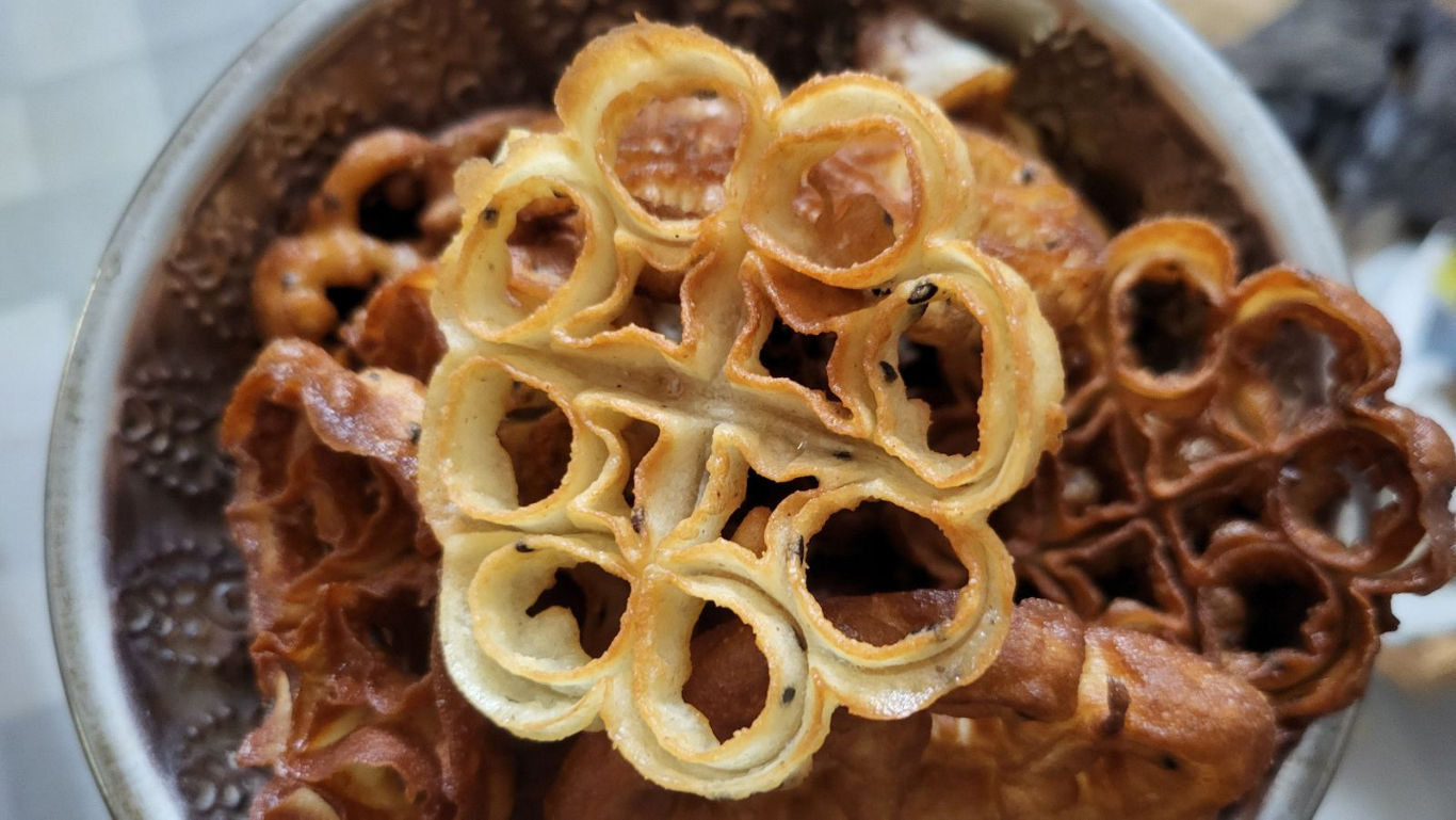 Close-up of flower-shaped fried pastries