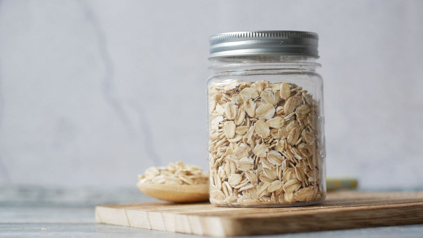 Glass jar filled with rolled oats